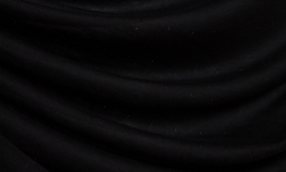 Тканина тонкий вовняний трикотаж італійський чорного кольору з перфорацією "краплі"                                                                                                                                                                        - Фото