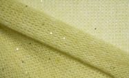 Тканина тонкий вовняний трикотаж для пошиття жіночого одягу італійський блідо-жовтого кольору з дрібними паєтками                                                                                                                                         